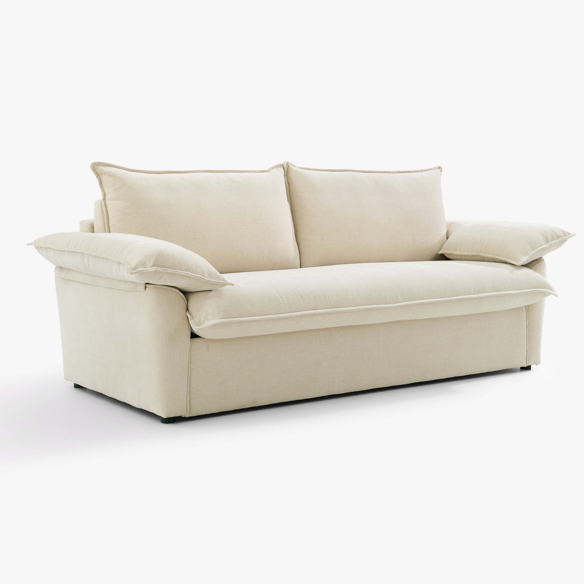 Angled front view of the Ease sofa bed in Bisque, showing its upholstered seat, two back cushions and cushioned arms.