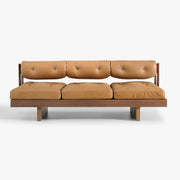 BASSO cognac leather sofa with walnut frame, straight-on studio view