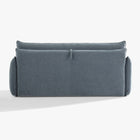 Blossom sofa bed in Celestine, showing the upholstered panel and central fabric pull loop for the fold-out mechanism.