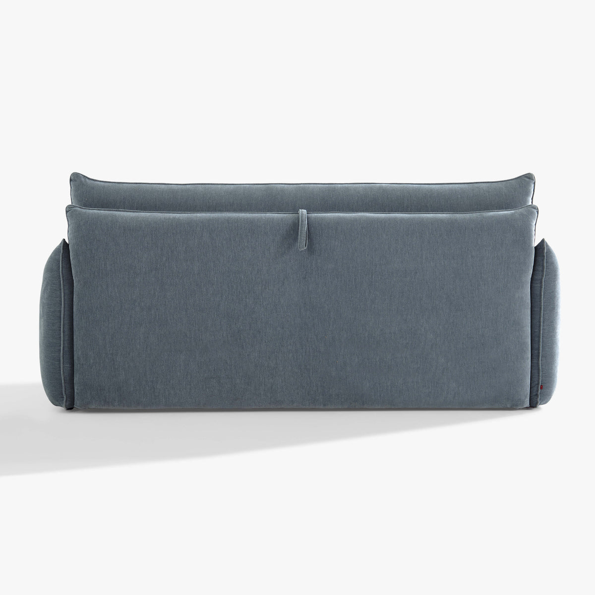 Blossom sofa bed in Celestine, showing the upholstered panel and central fabric pull loop for the fold-out mechanism.
