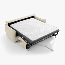 Blossom sofa bed in Bisque, fully unfolded with its quilted sprung mattress on the steel fold-out frame.