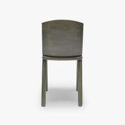 Rear view of the Tachi dining chair in green aniline-stained solid ash, highlighting the curved backrest and tapered legs.