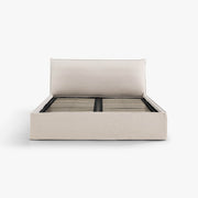 Front view of the Dormi queen bed frame in Bluff upholstery.