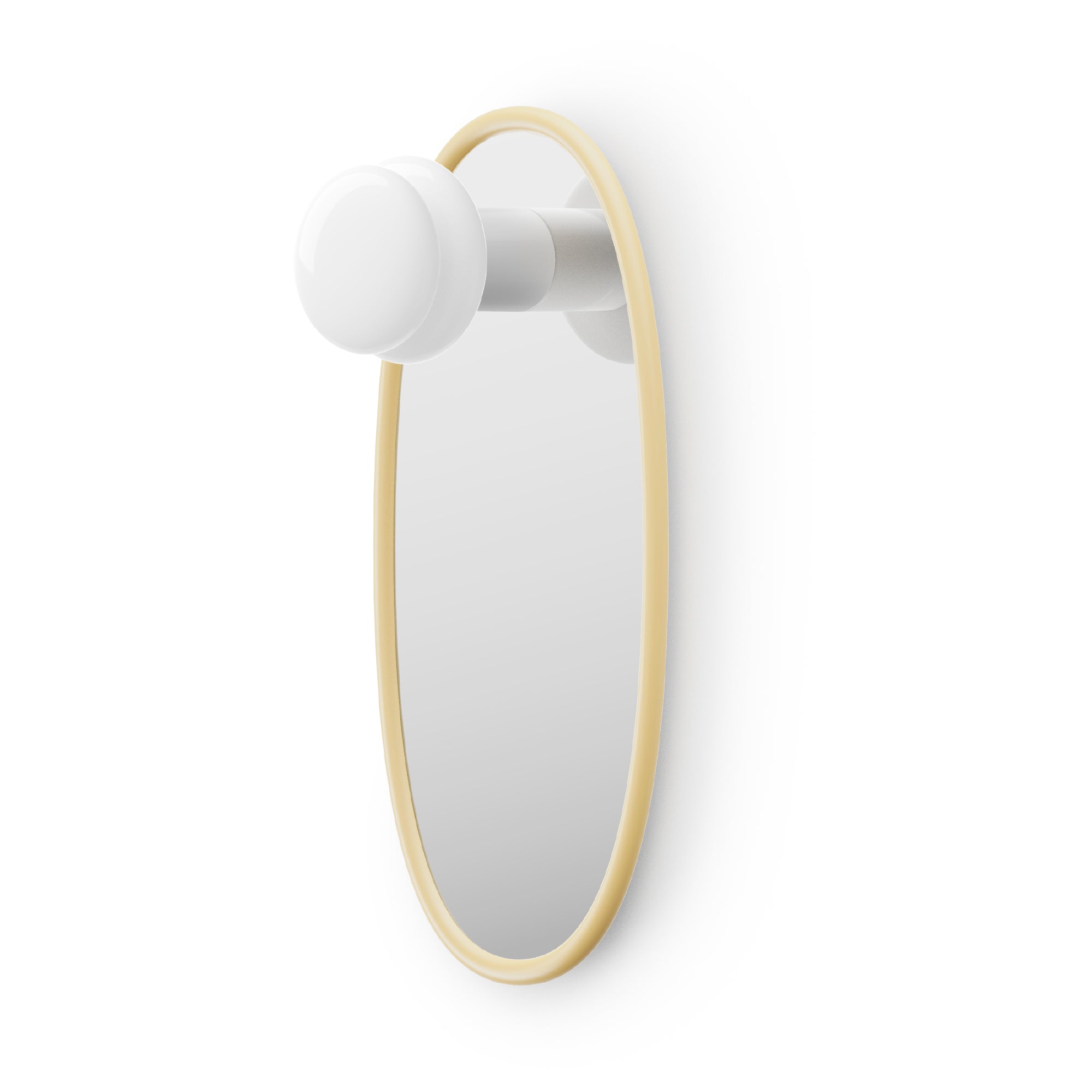 Oval shaped mirror with butter yellow frame and a portable lamp on a white background