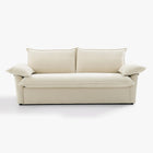 Front view of the Ease sofa bed in Bisque, showing two back cushions and cushioned arms.