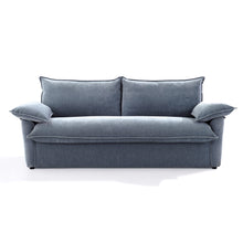 Front view of the Ease sofa bed in Celestine, showing two back cushions and cushioned arms.