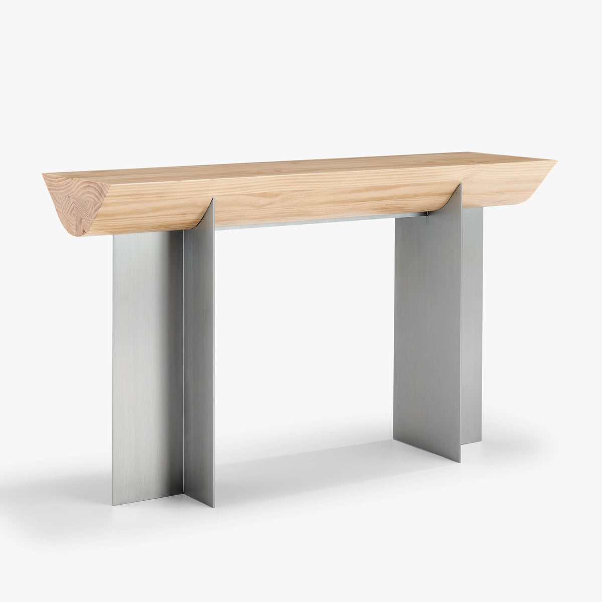 Three-quarter view of the Forma Atelier console table with a sculpted Douglas fir top and stainless steel supports.