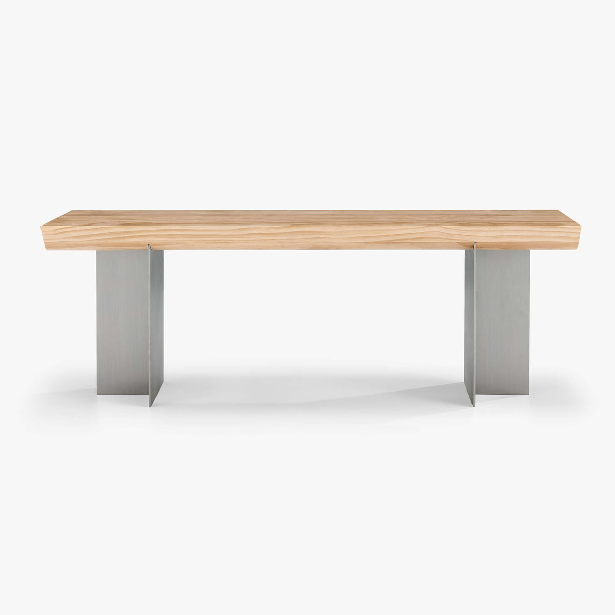 Front view of the Forma Atelier bench seat showing the long Douglas fir seat and two stainless steel supports.