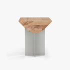 End view of the Forma Atelier side table showing the curved underside and end grain of its Douglas fir top.
