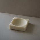 Resin on a gray surface with a neutral background