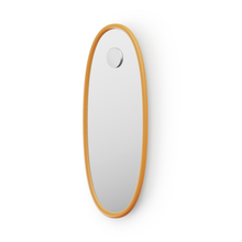 Oval shaped mirror with tangerine frame on a white background