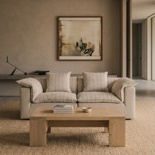 NOCTURNE two-piece sofa in Cobblestone Stripe upholstery in a warm neutral living room