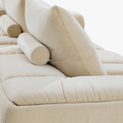RUE 3-seat modular sofa in Butter upholstery, close-up of cushions and bolster