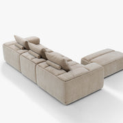 RUE 3-seat modular sofa with ottoman in River Clay upholstery, rear three-quarter studio view