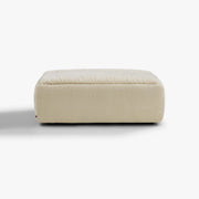 RUE ottoman module in Butter upholstery, rear studio view