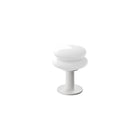 White shade and white base portable table lamp on a white background