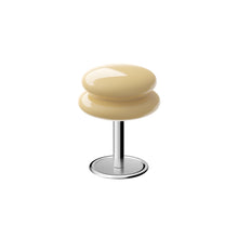 Butter coloured shade with a chrome metallic base on a white background