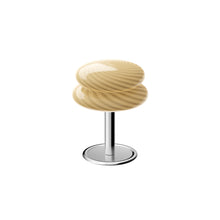 Butter coloured swirl patterned shade with a chrome metallic base on a white background