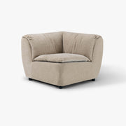 SOLACE corner module in River Clay upholstery, three-quarter studio view