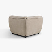 SOLACE corner module in River Clay upholstery, rear studio view