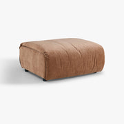 SOLACE ottoman module in Bronze upholstery, three-quarter studio view