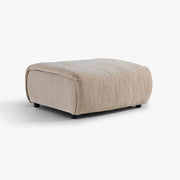 SOLACE ottoman module in River Clay upholstery, three-quarter studio view